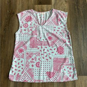 Andree by Unit Top. Light blue with red accents. Very cute! Women’s size medium.